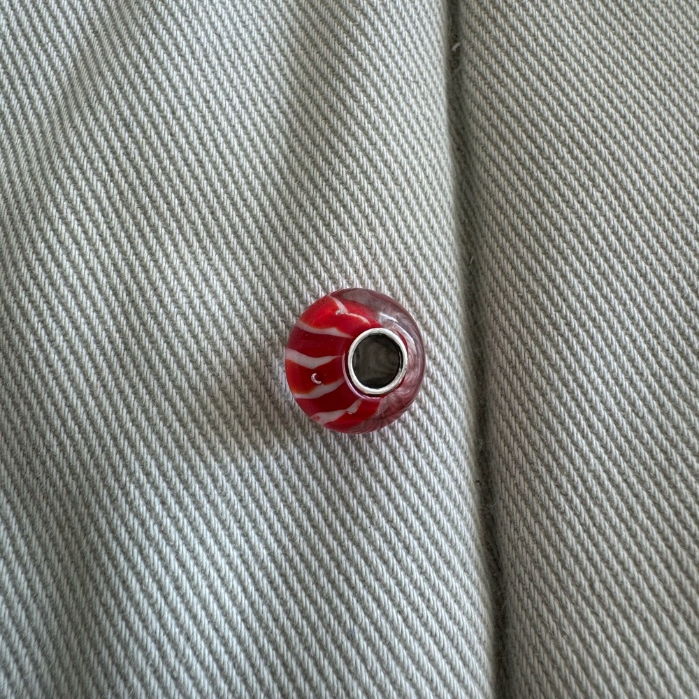Pandora red and white candy stripe Murano glass with silver core